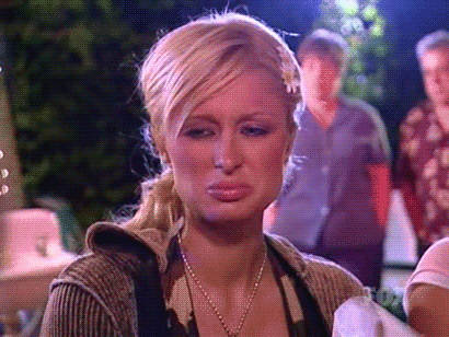 An animated gif of Paris Hilton making a grossed-out face
