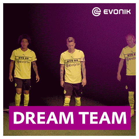 Video gif. Soccer players in yellow and black jerseys wrap their arms around each other and stand as a team united. Text, "Dream Team."