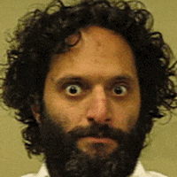 TV gif. Edited photo from the League of wide-eyed Jason Mantzoukas, who appears to be shaking.