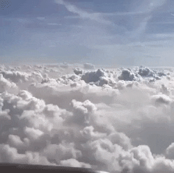 optik-koellner clouds plane flight GIF