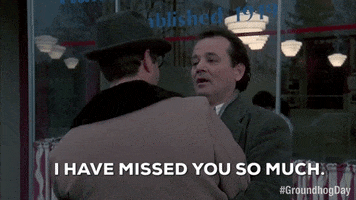 Movie gif. Bill Murray as Phil in Groundhog Day wraps his arms around Stephen Tobolowsky as Ned and says, "I have missed you so much." Then he pulls him in for a hug. 