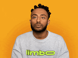 Celebrity gif. Rapper Amine holds two hands up to his head and opens them in an exploding gesture as a cartoon mushroom cloud emerges from the top of his head.