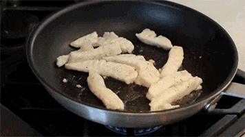 fish tacos cooking GIF
