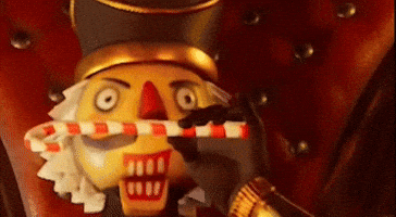 Smirk Smelling GIF