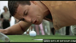 Movie gif. Adam Sandler as Happy Gilmore in Happy Gilmore is on his hands and knees next to a golf ball only a few inches away from the hole. He angrily yells at the ball.