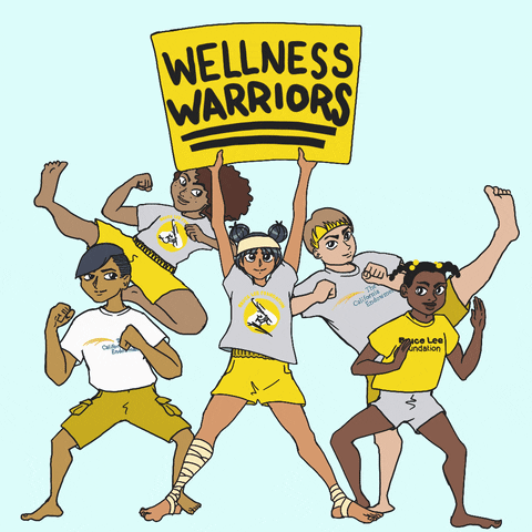 Digital art gif. Group of five cartoon people of different races and genders, all wearing Bruce Lee Foundation-themed workout gear, assume different martial arts poses against a pale blue background. The person in the middle of the group hoists a giant yellow sign into the air that reads, "Wellness Warriors," in all caps.