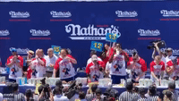 Competitive Eater Grabs Protester at Fourth of July Hot Dog Eating Contest