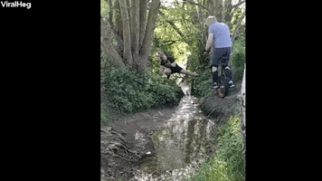 Man Trying To Jump Small Stream On Unicycle Prevails GIF by ViralHog