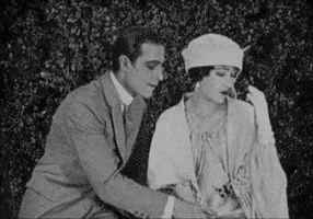gloria swanson it looks like he's biting her hand off GIF by Maudit