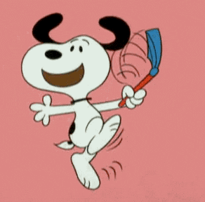 Peanuts gif. Snoopy runs in place excitedly with his ears flopped up while waving a blue noisemaker in the air.