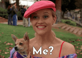 Movie gif. Wearing a pink beret and carrying a chihuahua, Reese Witherspoon as Elle Woods from Legally Blonde excitedly asks us: Text, "Me?"