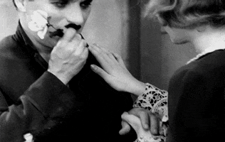 charlie chaplin and to think they didn't really get along sigh GIF by Maudit