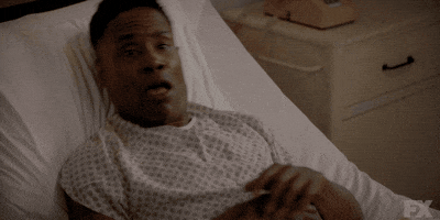 TV gif. Billy Porter as Pray Tell on Pose. He's laying in a hospital bed and he suddenly lurches up with a faux shocked expression, saying, "Ya think!?"