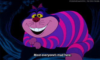 Disney gif. Cheshire Cat from Alice in Wonderland grins, curled up on a dark tree branch, saying, "Most everyone's mad here," which appears as text.