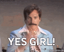 Video gif. A man in a blue jacket and pink scarf, dramatically tosses gold glitter in the air. Text, "Yes girl!"