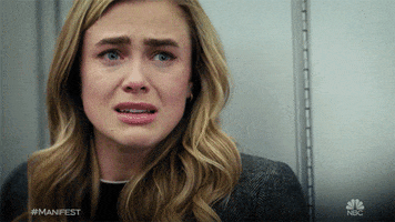 TV gif. Melissa Roxburgh as Michaela Stone on Manifest looks away and squeezes her eyes closed and frowns, trying to keep herself from crying too hard.