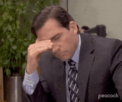 The Office gif. Leaning on his desk, annoyed, Steve Carrell as Michael Scott waves his hand and says, "Why don't you explain this to me like I'm five?" which appears as text.
