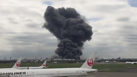 Black Smoke Clouds Tokyo Airport After Factory Fire