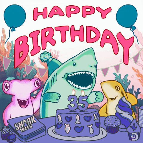 Digital illustration gif. A few different types of sharks, each a different color, look happy in front of a purple cake with the number 35. They are surrounded by coral and the cake is decorated with hearts and fish. Balloons float in the air next to the text, "Happy Birthday."