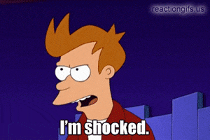 Cartoon gif. From the Futurama episode "The Lesser of Two Evils", an upset Fry tries to make sense of a plot twist. "I'm shocked. Shocked!" Suddenly, he's not upset anymore. "Well, not that shocked."
