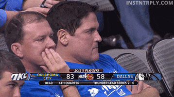 Celebrity gif. Mark Cuban is visibly upset at a basketball game. His arms are crossed and he scowls while saying, "Fuck."
