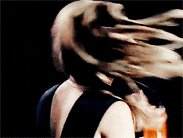 scarlett johansson hair flip GIF