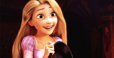 Disney gif. Rapunzel in Tangled smiles brightly and scrunches her shoulders in excitement.