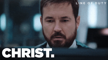 TV gif. Martin Compston as Steve in Line of Duty. He looks worried, with his brow furrowed and mouth set in a grim line. He says, "Christ,"  while staring at his computer.