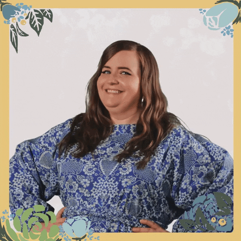 TV gif. Aidy Bryant as Annie in Shrill holds her hands on her hips as she slides her head from side to side with a smile while glancing sideways as us.