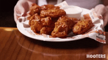 Hungry Chicken Wing GIF by Hooters