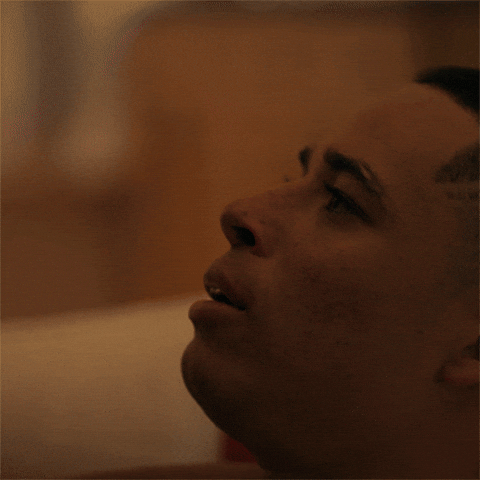 TV gif. Anthony Ramos as Mars on She's Gotta Have It looks at us quizzically, as pink question marks pop up around him.