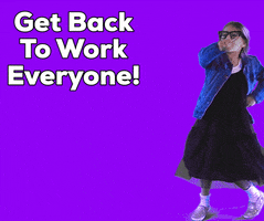 Video gif. A girl in thick black glasses and a jean jacket slides on screen with 1 hand on her hip and a finger pointing back where she came from. She claps her hands together decisively and says,"Get back to work everyone. Come on! Let's go! Move it!"