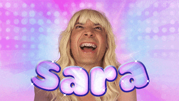 TV gif. Wearing a platinum blonde wig and braces, Jimmy Fallon smiles like a teen girl, against a pink and blow glowing background and behind bubbly text that reads "Sara."
