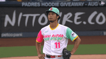 Sports gif. Yu Darvish of the San Diego Padres puts his hands behind his head, breathing out and putting his hands on his head then his hips, like someone just made an embarrassing error.