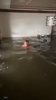 'Beautiful Day for a Swim': Man Floats Around Flooded Naples Home