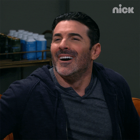 Celebrity gif. Actor Josh Server offers a reassuring double thumbs up before falling back and passing out on the sofa. 