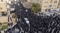 Flouting COVID-19 Restrictions, Thousands of Ultra-Orthodox Israelis Attend Rabbi's Funeral