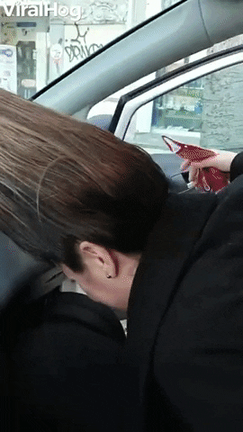 Woman With Troll Hair Struggles To Get Into Car GIF by ViralHog