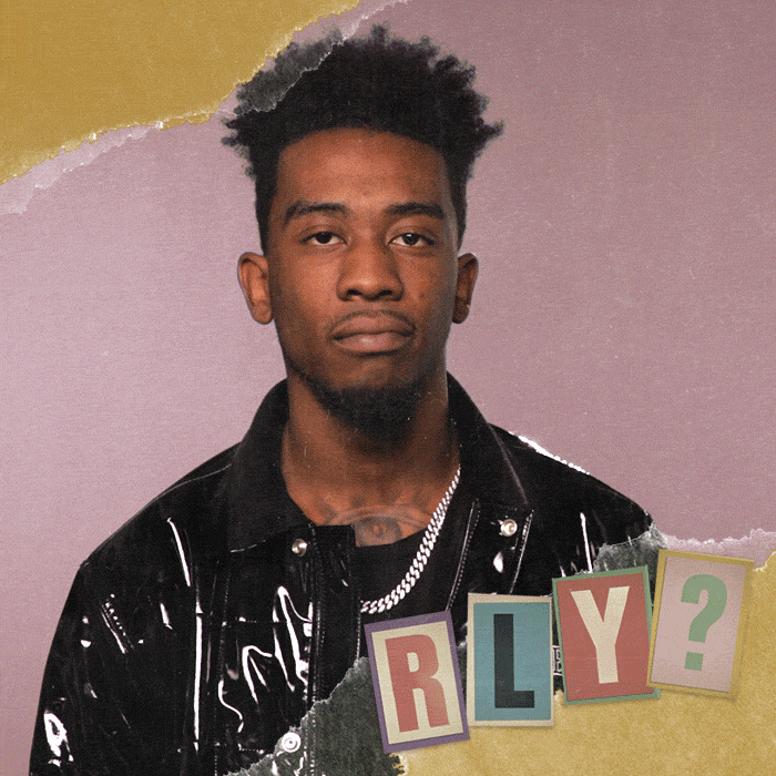 Celebrity gif. Rapper Desiigner looks at us with a deadpan expression, and tilts his head disappointedly. Text, “really?” but spelt R L Y.
