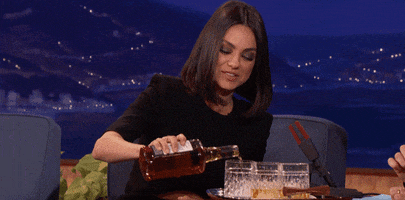 mila kunis drinking GIF by Team Coco