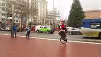 It Just Isn't Christmas Until You See a Flaming Bagpipe-Playing Santa on a Unicycle