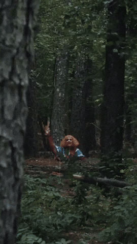 Waving Julia Garner GIF