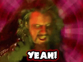 Music video gif. Rob Zombie in "Meet the Creeper" video with his hand stretched toward us, seizing wildly in front of a red and yellow psychedelic background.