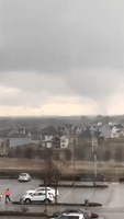 Funnel Cloud Forms Amid Tornado Warnings Near Kansas City, Missouri