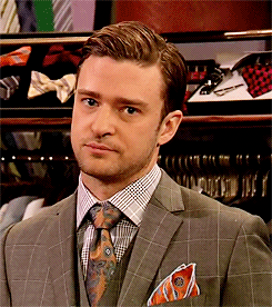 Celebrity gif. Justin Timberlake with his head cocked to the side, looking at us with shade.