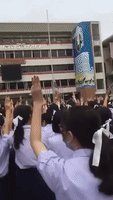 Bangkok School Students Raise 'Hunger Games' Salute in Protest