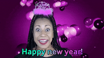 Video gif. A woman with a pink tiara grins at us merrily, shrugging her shoulders for emphasis as pink balloons fly behind her. Text, "Happy new year!"