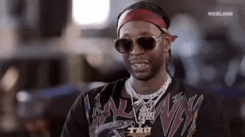Celebrity gif. 2 Chainz deliberates, then goes quiet, shaking his head and tossing up his hands, speechless.
