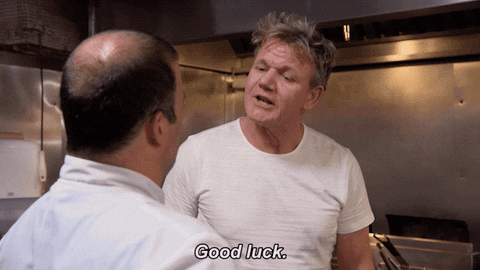 GIF of Gordon Ramsay saying good luck and giving a handshake and hug to a contestant