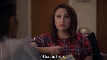 TV gif. Francia Raisa as Ana on Grown-ish sits across from Tara Shahidi as Zoey Johnson on a couch. She holds a cracker in her hand, and stares thinking for a moment with a blank expression. She then points at Zoey, tilting her head as she says, “That is true.”